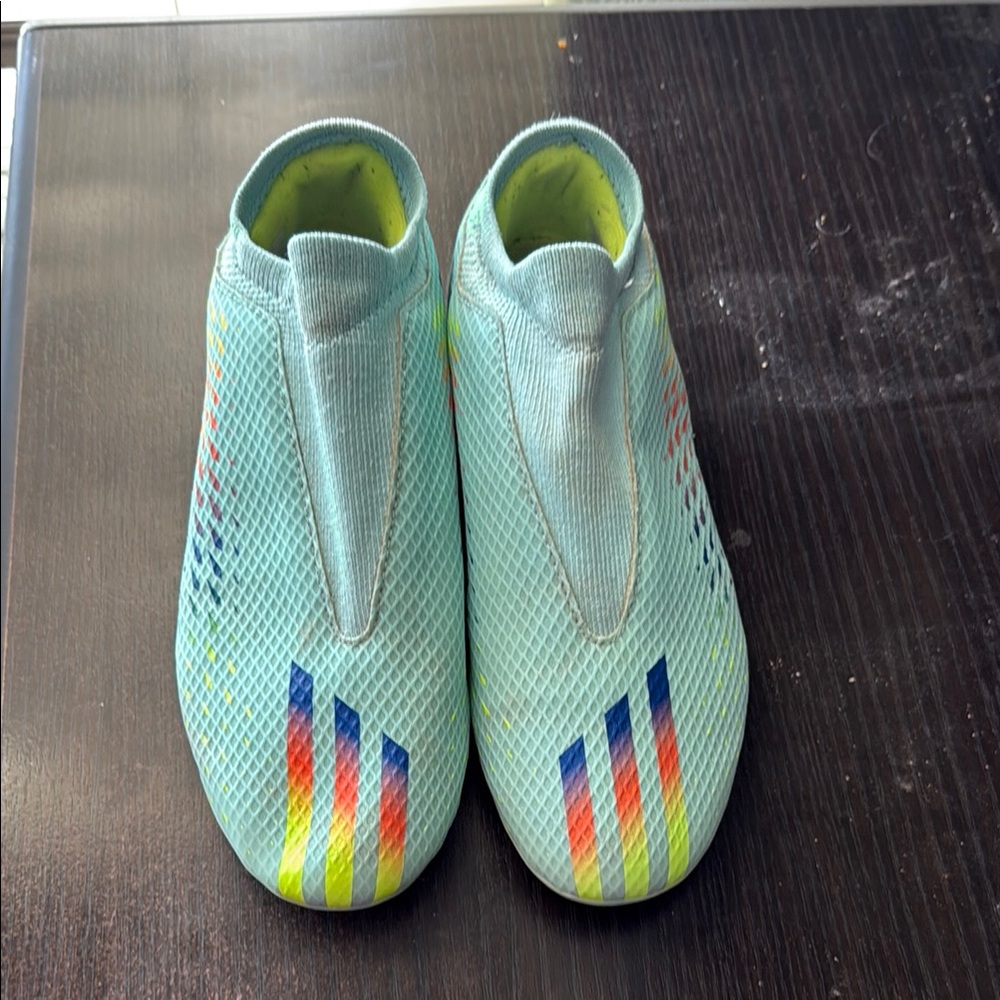 Adidas X Speedportal.3 laceless firm ground soccer cleats.